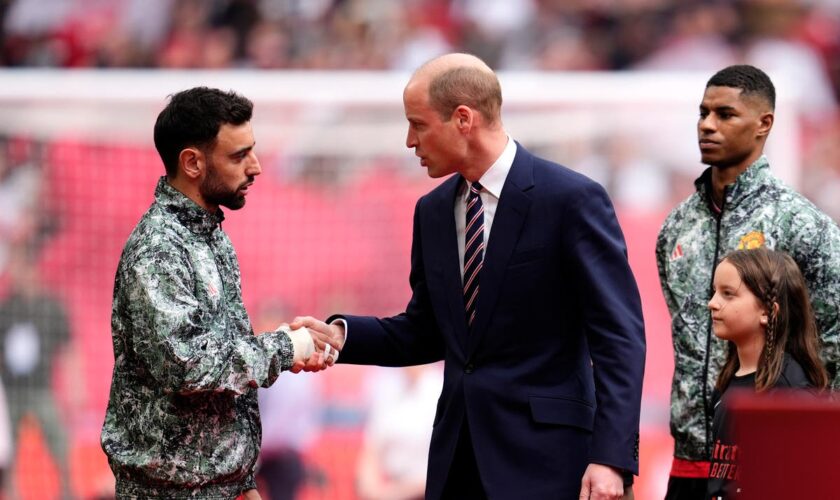 Royal news – live: Prince William attends FA Cup Final as Harry and Meghan portrait finds new home