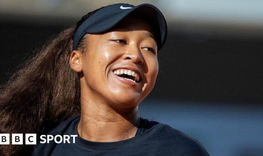 Naomi Osaka laughs during French Open practice