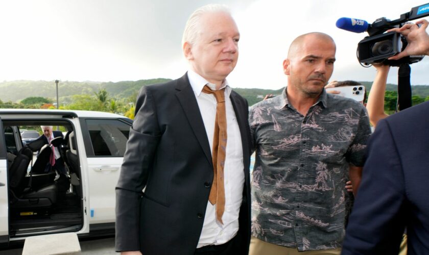 Julian Assange arrives at the United States courthouse in Saipan Pic: AP