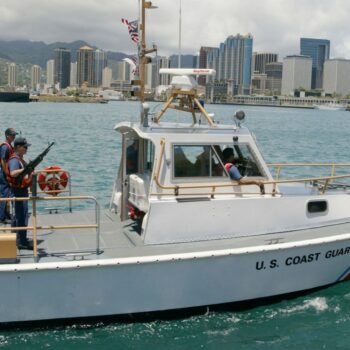 Coast Guard rushes to aid people in 'distressed' boat that was 'rapidly sinking'