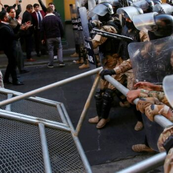 Bolivian soldiers storm plaza; former general accused of coup attempt