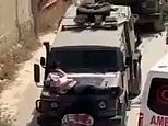 Disgust as footage emerges of a wounded Palestinian man strapped to hood of an IDF jeep as Middle East conflict continues to rage