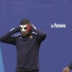 Le masque tricolore de Kylian Mbappé à l'entraînement avant Pays-Bas/France