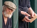 Sir Ian McKellen is spotted for first time since stage fall: Actor, 85, hugs friend outside his London home after spending three nights in hospital following accident during his West End show