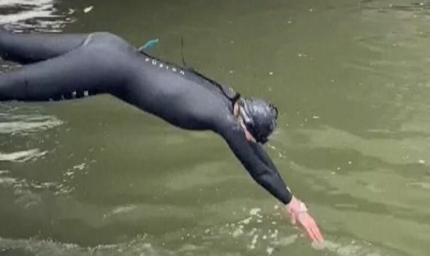 Sports minister swims in Paris river despite unsafe levels of E.coli ahead of Olympics