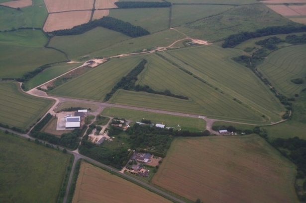 Pilot killed after light aircraft 'comes down' as investigators comb site of crash