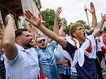 England fans get party started as huge crowds flood into central London: Police clash with boozing supporters who let off flares in Trafalgar Square - as pubs fill up across the country hours before kick-off