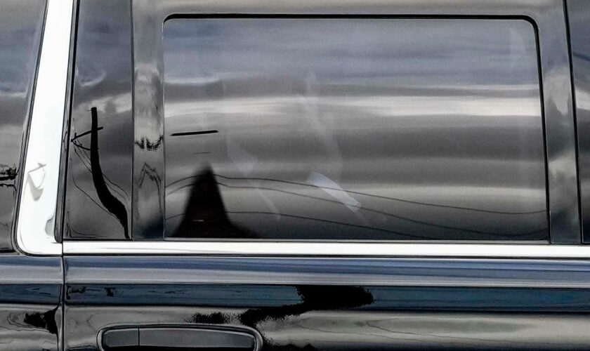 Donald Trump waves to supporters after arriving at Milwaukee Mitchell International Airport. Pic: AP