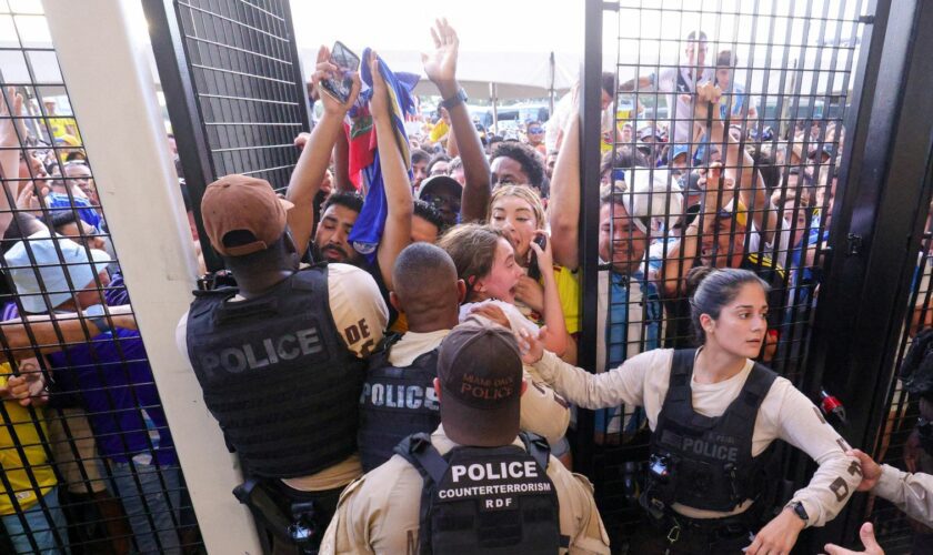 Jul 14, 2024; Miami, FL, USA; fans rush the gates before the Copa America Final match between Argentina and Colombia at Hard Rock Stadium. Mandatory Credit: Nathan Ray Seebeck-USA TODAY Sports TPX IMAGES OF THE DAY