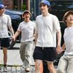 Stranger Things stars Finn Wolfhard and Gaten Matarazzo hold hands as they go house hunting with Gaten's girlfriend Elizabeth Yu in New York City