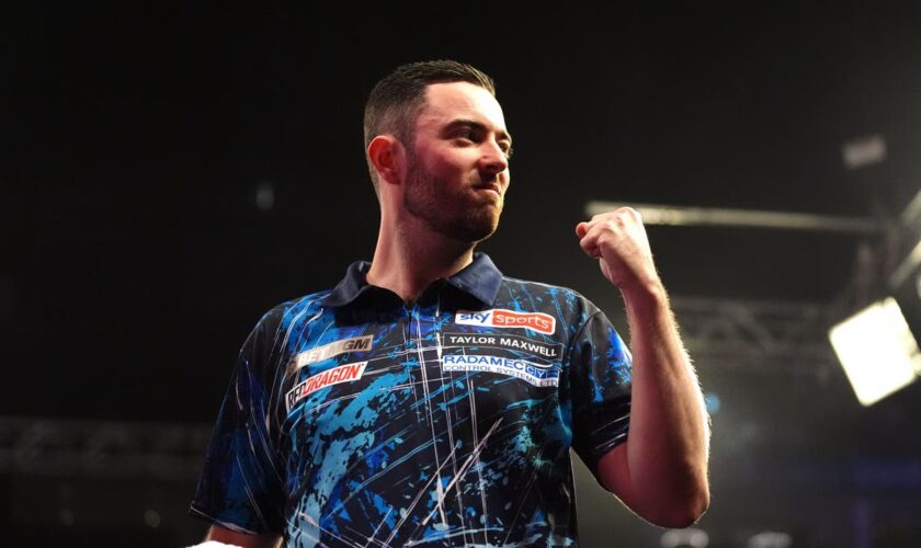 Luke Humphries battles past Dimitri Van den Bergh to reach Blackpool semis