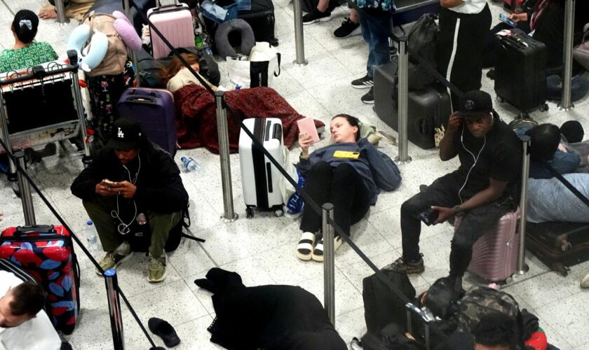 Passengers waiting in the South Terminal at Gatwick Airport after the outage. Pic: Aaron Chown/PA