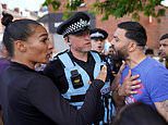 Hundreds of people descend on streets of Leeds for the SECOND night in a row demanding that children who were filmed being hauled from their family home yesterday are returned with their parents now reportedly on 'hunger strike'