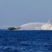 Chinese Coast Guard vessels fire water cannons towards a Philippine resupply vessel Unaizah May 4 on its way to a resupply mission at Second Thomas Shoal in the South China Sea,.Pic: Reuters