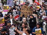 Crowds of protesters block roads and trams in Manchester city centre branding police 'racist' and calling for cops to be sacked over airport 'kicking and stamping' attack - as watchdog opens second probe and sets up witness hotline