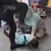 Revealed: How man ramming elderly woman with luggage trolley at Manchester Airport sparked 'altercation' that saw two men violently arrested by police... as Government's political violence tsar warns protesters against 'mob rule'