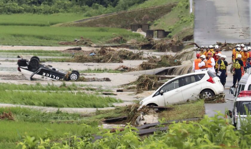 Heavy rain in northern Japan triggers floods and landslides, forcing hundreds to take shelter