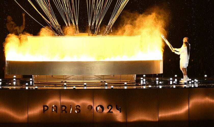 French Olympic heroes Marie-José Pérec, Teddy Riner light cauldron to kick off Paris games