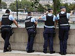 Who was behind French rail network attack? Transport minister says system is on high alert - but admits there is 'no new evidence' as detectives probe theories that leftists or Putin agents firebombed junctions as Olympics opened in Paris