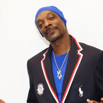 Snoop Dogg celebrates with US swimmer's wife during gold medal race in heartwarming moment