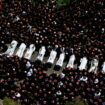 People gather for the funeral of children who were killed at the football pitch in Majdal Shams. Pic: Reuters