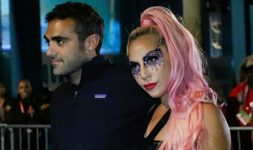 NFL Football - Super Bowl LIV - Kansas City Chiefs v San Francisco 49ers - Hard Rock Stadium, Miami Gardens, Florida, U.S. - February 2, 2020. Lady Gaga and Michael Polansky leave after the game