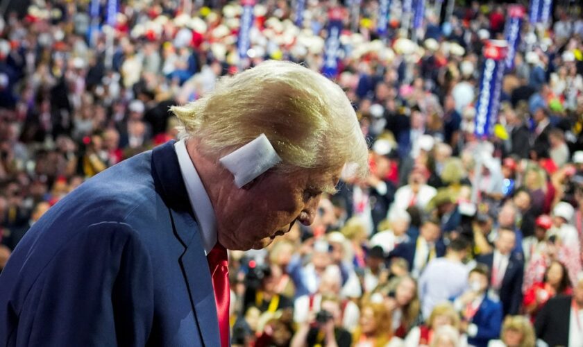 Republican presidential nominee and former U.S. President Donald Trump walks during Day 1 of the Republican National Convention (RNC) at the Fiserv Forum in Milwaukee, Wisconsin, U.S., July 15, 2024. REUTERS/Cheney Orr TPX IMAGES OF THE DAY