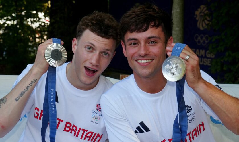 Tom Daley and Noah Williams with their silver medals. Pic: PA