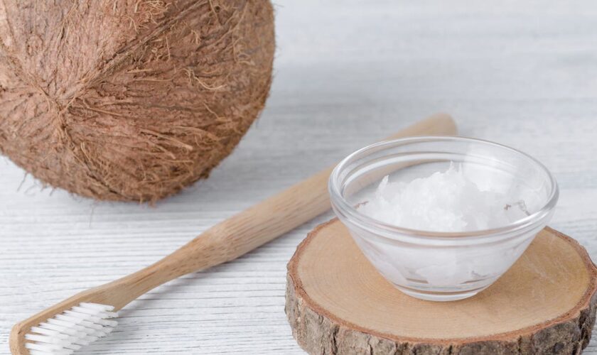 What is oil pulling? Experts warn against coconut oil oral health hack