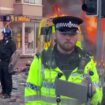 Flames engulf police van as Southport protesters clash with officers outside mosque