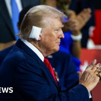 A bandaged Trump walks into the Republican convention