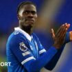 Amadou Onana applauds in Everton kit