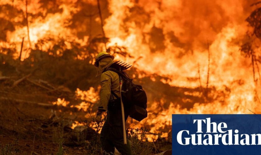 Firefighters continue battle against more than 100 blazes burning in the US