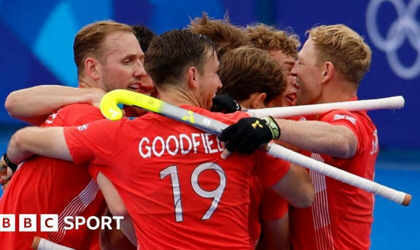 Great Britain's Nicholas Park and Jack Waller celebrate a goal against Spain in the hockey