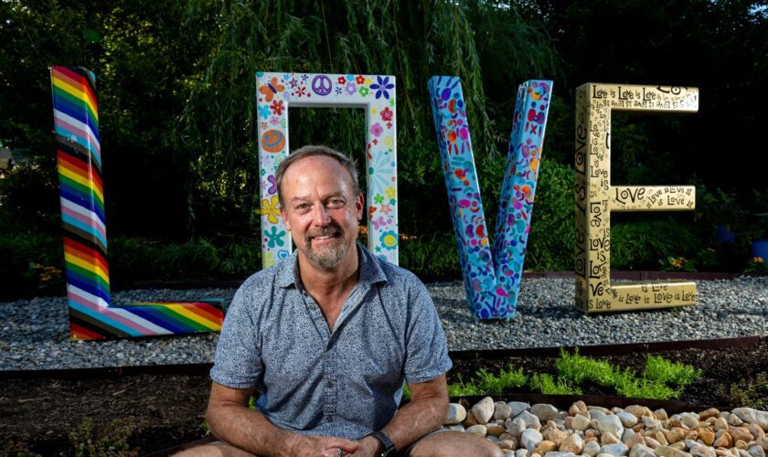 His pride sign decayed as he fought cancer. Neighbors revived it.