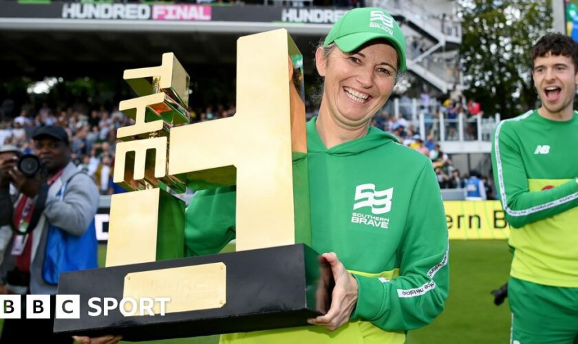 Southern Brave coach Charlotte Edwards celebrates with the trophy after winning The Hundred women's competition in 2023