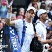 Andy Murray waves to the Wimbledon crowd as he walks out onto Centre Court