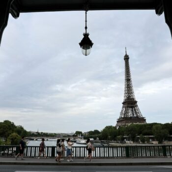 Paris Olympics live updates: Crowds swell, rain falls at Opening Ceremonies