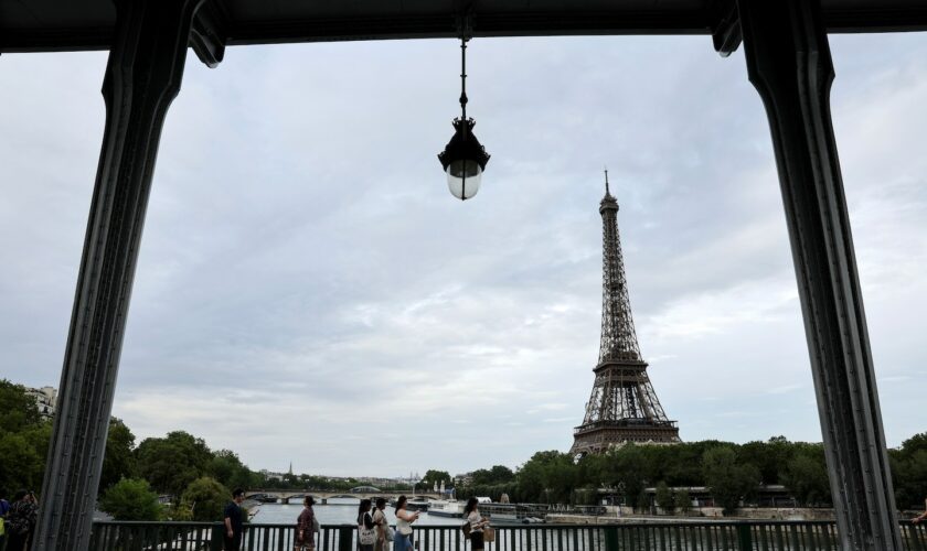 Paris Olympics live updates: Crowds swell, rain falls at Opening Ceremonies