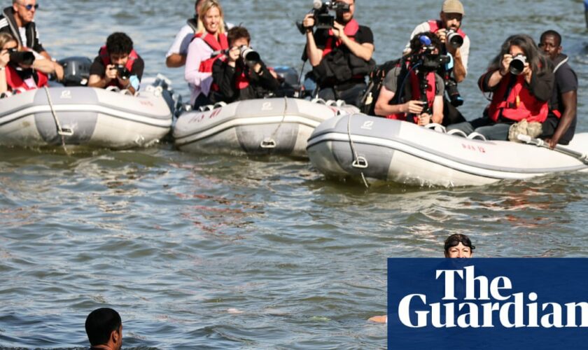 Paris mayor swims in Seine as river is cleaned up just in time for Olympics