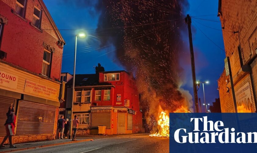 Police car turned over and vehicles set alight in disorder in Leeds