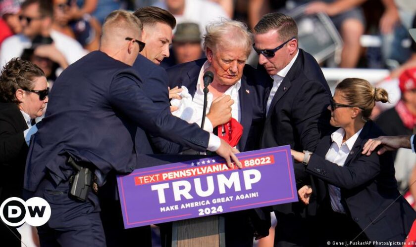 US: Donald Trump 'safe' after being rushed off rally stage