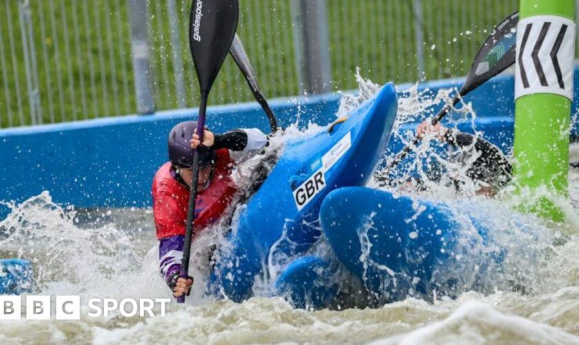 Kimberley Woods competes in kayak cross at the World Championships