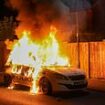 Second night of violence erupts in tinderbox Britain: Over 100 thugs are arrested, police cars are torched and more officers are injured in riots as anger continues to grow following Southport stabbings