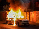 Second night of violence erupts in tinderbox Britain: Over 100 thugs are arrested, police cars are torched and more officers are injured in riots as anger continues to grow following Southport stabbings