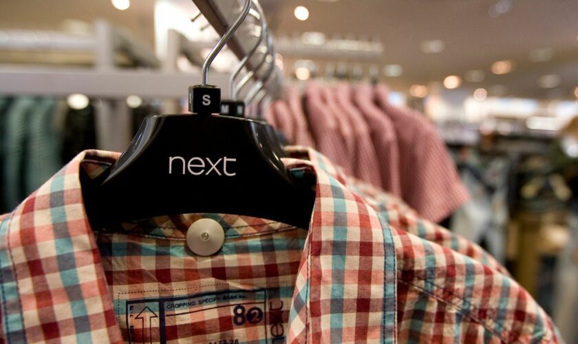 Internal photograph of a Next clothing Store (Newscast Limited via AP Images)