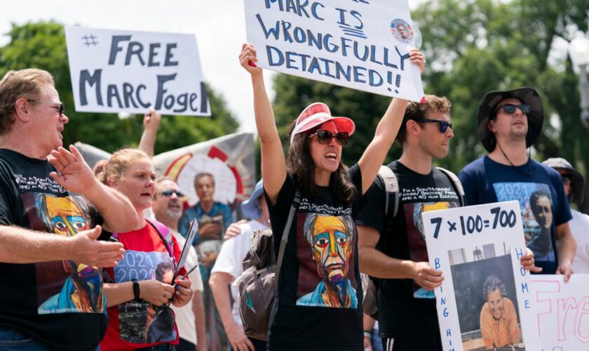 Mr Fogel's family protested outside the White House in July 2023. Pic: AP