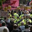 Protests in Manchester turn to trouble in just MINUTES as two men are arrested for public order offences there after separate night of riot violence in Sunderland - as tinderbox Britain braces for further trouble as a smaller crowd masses in Portsmouth