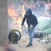 First country issues warning over travelling to the UK amid violent protests - as it urges citizens living in Britain to 'remain vigilant'