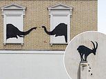 Banksy unveils second artwork in 24 hours: Silhouettes of two elephants poking their heads out of blocked out windows appear on building in London